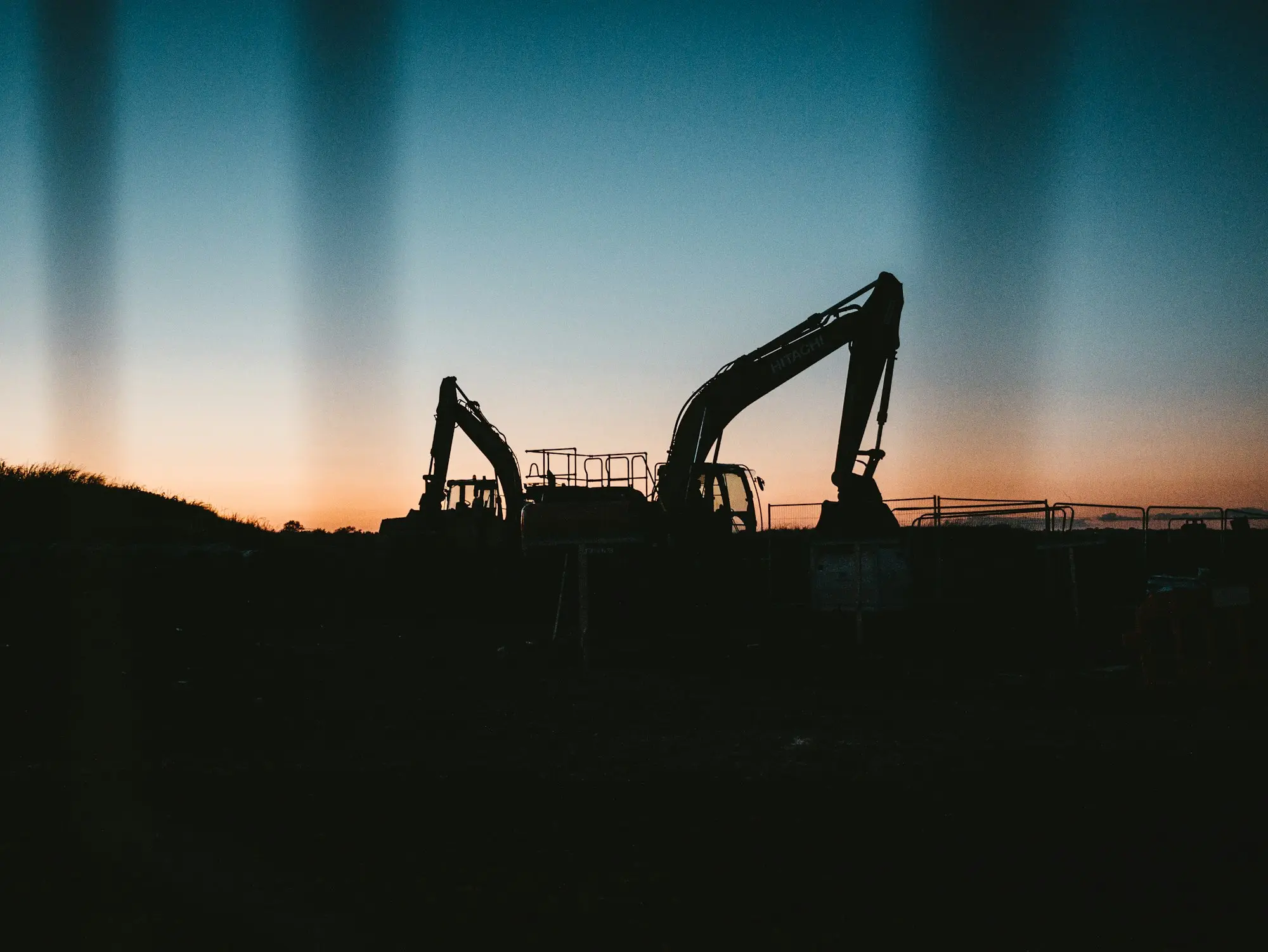 Excavator working on an earthmoving site near Geelong at sunrise